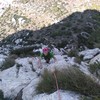 Just below the summit. The switchbacks of the approach trail are visible far below.