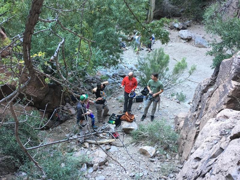 Jared Putterman, Renee Genovese, Michael Genovese, Ryan Mann and Daniel Peterson hanging around the base of the route.