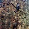 Last of the Mohicans, a 5.7 crack. You can place trad gear on this crack on lead, top-rope it, or reach out and clip draws on the route to the right of it. The bolted route on the left is Tomahawk (5.10+).