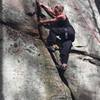 Tonto crack (5.8). No bolted anchors up top, but there is a tree about 12 feet from the edge for setting up a top-rope anchor. Lots of classic layback moves.