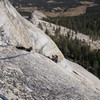 Tom Rogers on the crux of P3. The crux is a short section of slick granite for feet.