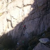 Start of route(s) and best belay location. Thomas Pham FA of Worth the Stay(5.9), Marta Reece belaying, Drew Chojnowski in green.