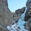 Thatchtop NE Gully, 17 Dec 2017. 30 meters WI3. At the top of this pitch was a rat’s nest of tat with two oval biners to rap off. Didn’t climb higher due to high winds. There might have been more ice higher, but didn’t see it.