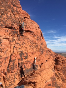 Jody on lead.  Love that you can see the strip in the background from this climb!