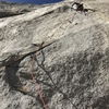 Brett Clark; first aid lead. Topstepping, hooking, and micro-cam or cam-hook placements in a hollow flake up to riveting. Great route to practice on!