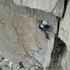 Looking down at pitch 9.  Be weary of the sharp edge above the climber if you link it into pitch 10