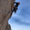 Sean Peters firing through the overhanging cruxes at the bottom of the route