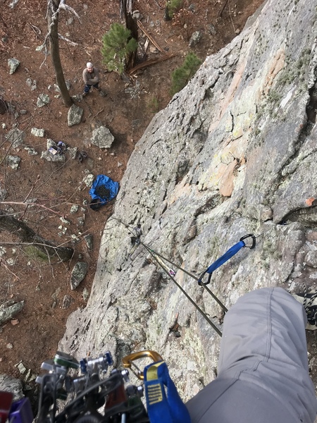 Me looking down from the bolt anchor. Nice 5.8 face trad (or at least I led it on gear instead of the 4 bolts)!