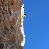 Tiffany enjoys some sunny arete climbing in the upper section.
<br>
Photo: Mark Erman