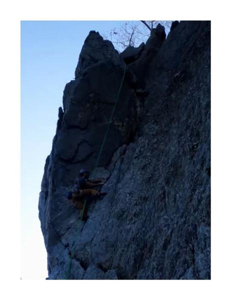 5.6 Last Exit.  Short section of layback. In this picture the chimney section is where the rope disappers around the rock.