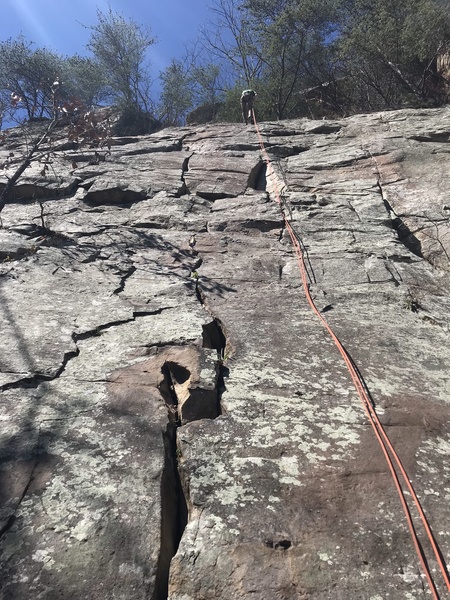 Thierry rappelling on Cathedral Crack.