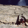 Dale Navish leading the first real pitch of the route. August 1988