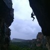 Some Austrian climber on Menage a Trois (I think) on a rainy day (route stays dry)