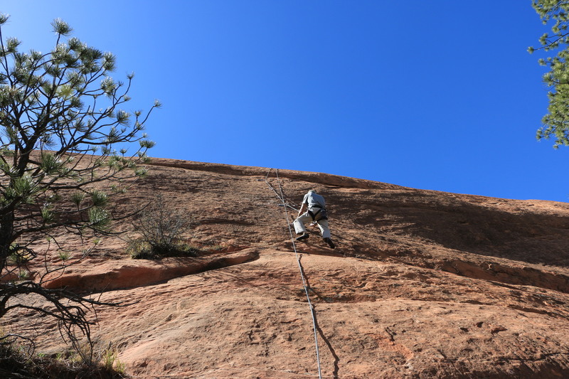 Toprope, see the low angle slab and bush on the left.