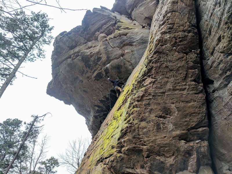 William clips the 1st bolt on the roof of Brick Attack