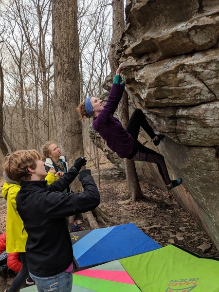 Natalie making moves into the crux of Suckah (V3). From the massive jug, rocket up and slightly right to the slopper. We found it easier to find the hold when we marked it with a little chalk since it is far away and hard to