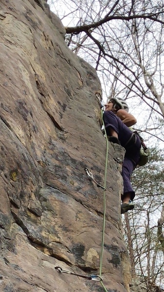 Erica on the fun "foot at your face" rock over move