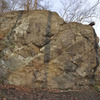 Frameshift Boulder - Left end of the First boulder, 500ft after the Park entrance sign and gate.