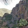 Main Wall from the approach trail. Climbers on Submission just left of the prickly pear.