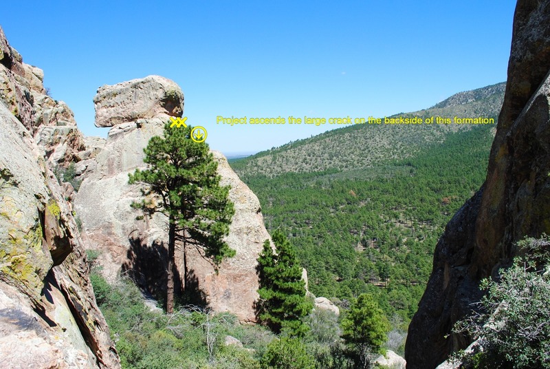 Steep Offwidth is on the back side (downhill side) of the T-Rex formation in the center of the photo