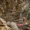 David working his way up through the first bolt on Monkey in the Middle