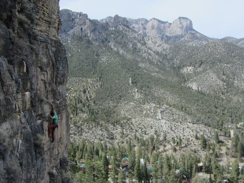 Mike Bond entering the crux high on The Belltower.