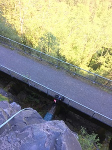 At the top of the route and you can see my partner belaying me from the ledge.