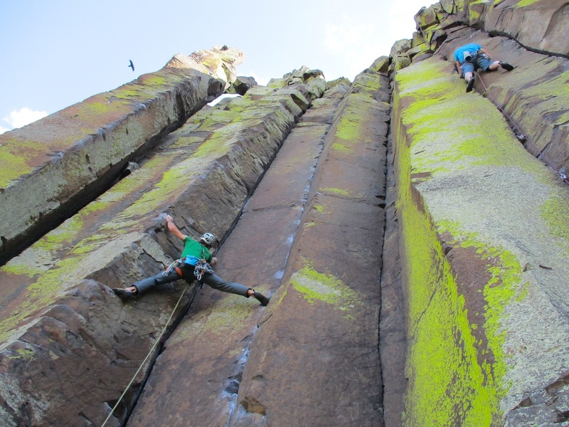 Geoff leading Sex Party (climber in upper right corner on The Elders).