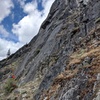 a view of the start of the climb. Climber in blue is stringing together the first 2 pitches. Thought this might help others confirm they've found the start of the correct climb.