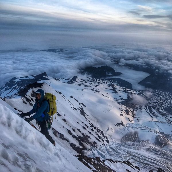 high up on Liberty Ridge with Carbon Glacier in the background.