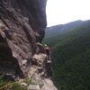 Shaun following the "f*** this choss" traverse after the 5th bolt of p3. Traversing left after the crux is basically a 5.7/8 escape route.