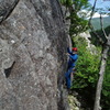 RW about 15 ft up the "far right" line. This starts in a corner on the path up,15 ft below the usual base area.  Top roping the route from the bolts you should put in a directional (#2 Gold, Camalot) on the Arete, or face a bad swing.