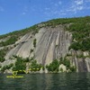 There is a cluster of trees at onlookers slight left of center. There is a nice spot that gets shallow to pull a canoe or boat in. We struggled finding a good description of where to land the canoe, figured I would upload a picture describing the location