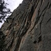 Lauren in the distance leaving the belay at the top of Riding with the Ravens and entering pitch 2 of The White Raven.