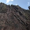 Myself leading Inside S. Face at Gregory Canyon. There is deck potential between the third and fourth piece of gear, but a solid 5.9 trad leader should have no issue in this section. The crux is easy to miss if not paying attention.