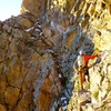 Crossing over the top of the North Chimney on Broadway Ledge. It's 3rd/4th but exposed and loose, so be careful, especially if there are other climbers coming up the North Chimney below.