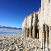 A section of the spectacular Crowley Columns with frozen lake & mountains to the west.