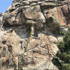 Henry Faust at the chains of Loch Ness Monster, 11b (yellow). Green line to the right is Gemini, 12a (very high 1st bolts on both climbs).