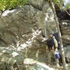 Steve E. standing next to one of the lower walls/boulders in the Outlying Area. Just below the power line clearing. Steve is just over 6 feet tall