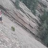 Coach Dave climbing through the crux on Smooth.