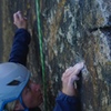 Characteristic holds on route. Miranda N. climbing.