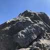 The final 20ft of slab before the summit. There are many large protrusion on the slab that make it easier than it looks. Definitely the most exposed part of route. There is also a hand crack just to the left of this photo that is climbable but harder.