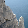 Climbers on pitch 2 of Arete de Marseile.
<br>
Photo credit: https://www.camptocamp.org/routes/55467/fr/calanque-de-sugiton-la-candelle-arete-de-marseille