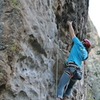 James reaching for the undercling/jug above bolt three.