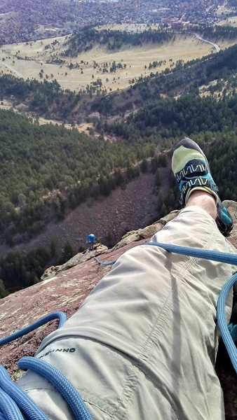 Bringing up Eric on the final headwall pitch.