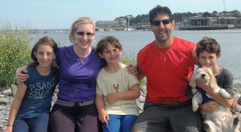 The Chalnicks sitting on the bar at Bar Harbor Maine