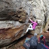 Climber on a fun face line with perfect sculpted holds. In corridor near barn. Access Fund/Z. Lesch-Huie photo.