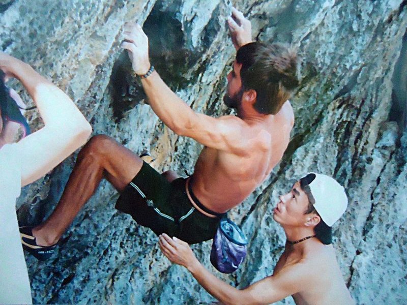 Chris Sharma climbing with Kato Machihiro at Cape Hedo