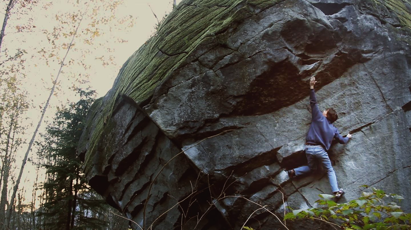 Jake Love reaching through the crux move on Kombucha (v7)