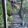 The rickety bridge on the approach from the country